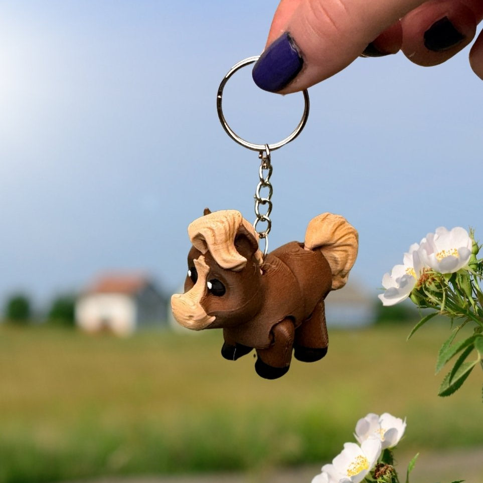 Horse and donkey keychains positioned side by side, showing their differences and similarities in design. Great as a pair or part of the full animal set.