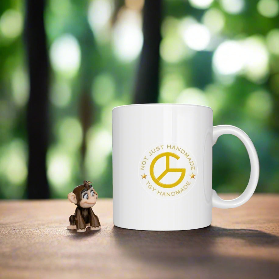 The monkey keychain is attached to the zipper of a bright backpack, swinging slightly, showing how it adds a fun, personal touch to school bags or travel gear.