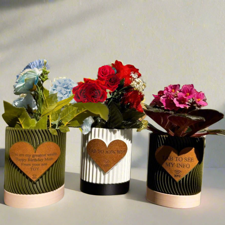 ultiple engraved pots displayed on a shelf with varied messages
An arrangement of several personalized flowerpots on a wooden shelf, each engraved with different heartfelt messages such as “Thank You,” “Grow Together,” and “Love Blooms Here.” The variety showcases the customization options and makes the display visually appealing, ideal for group gifting or themed home decor.