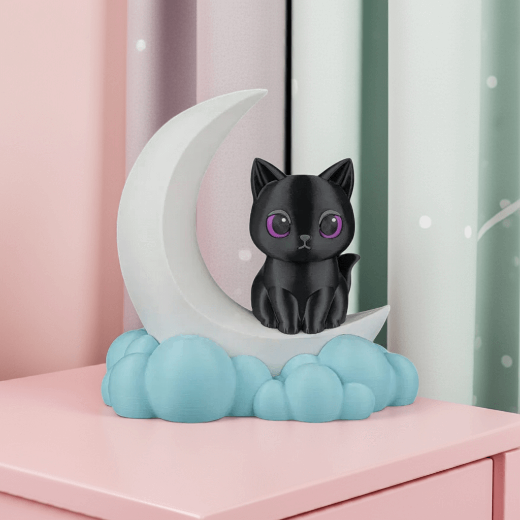 Black cat figurine on a moon and cloud design with a pink background