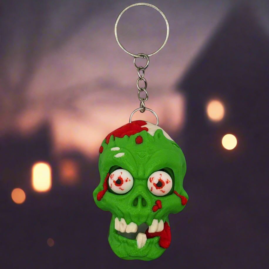 Zombie Skull Keychain – add spooky vibes to keys or bags with this skull-themed accessory