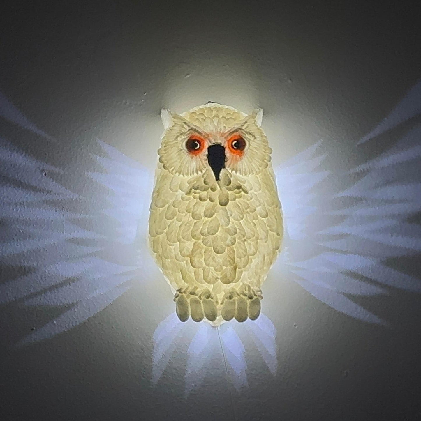 Front view of the Hedwig the Owl Night Lamp, showcasing its detailed 3D-printed owl design with wings spread, creating a soft glow