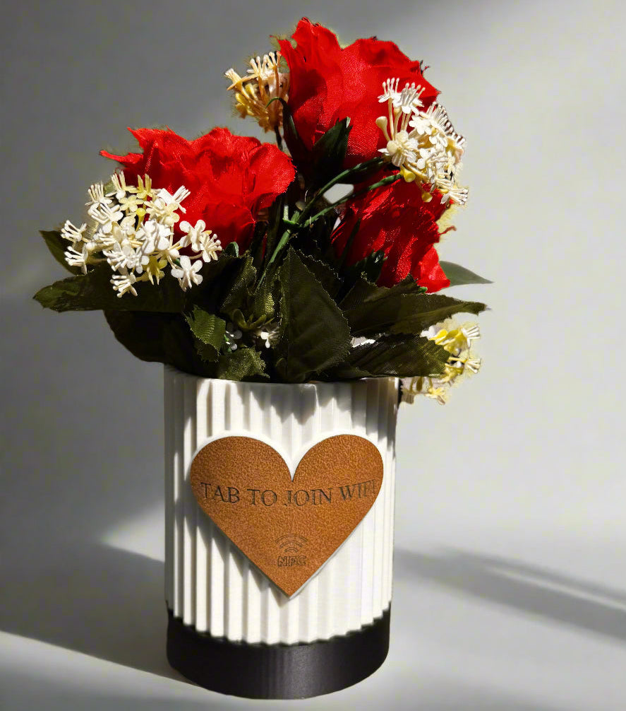 ultiple engraved pots displayed on a shelf with varied messages
An arrangement of several personalized flowerpots on a wooden shelf, each engraved with different heartfelt messages such as “Thank You,” “Grow Together,” and “Love Blooms Here.” The variety showcases the customization options and makes the display visually appealing, ideal for group gifting or themed home decor.