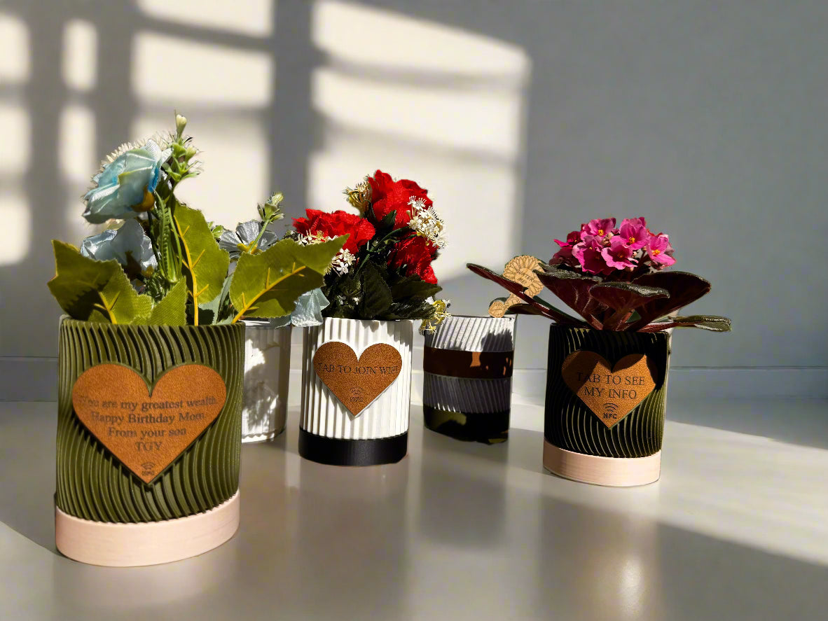 ultiple engraved pots displayed on a shelf with varied messages
An arrangement of several personalized flowerpots on a wooden shelf, each engraved with different heartfelt messages such as “Thank You,” “Grow Together,” and “Love Blooms Here.” The variety showcases the customization options and makes the display visually appealing, ideal for group gifting or themed home decor.