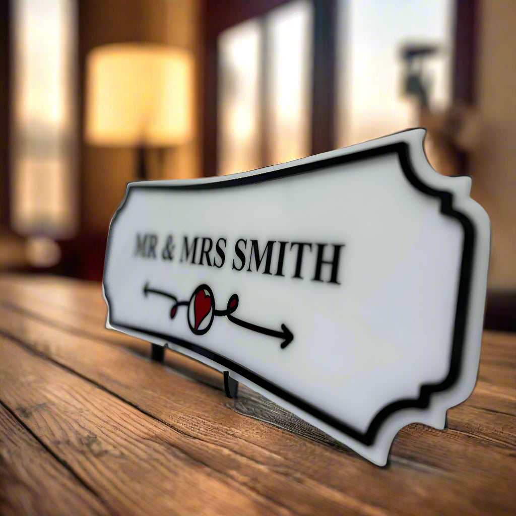 Personalized nameplate with 'Mr & Mrs Smith' on a marble background
