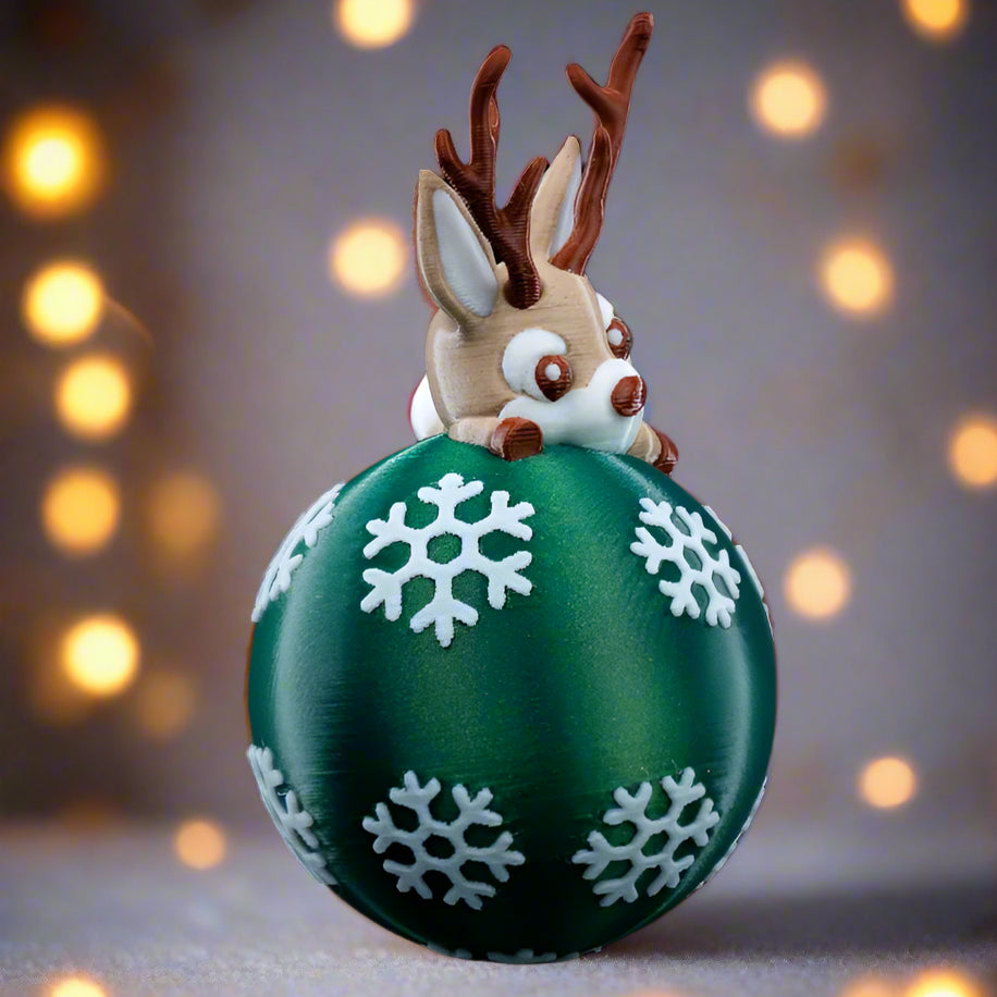 3D printed Lying Reindeer ornament adding charm to a Christmas tree