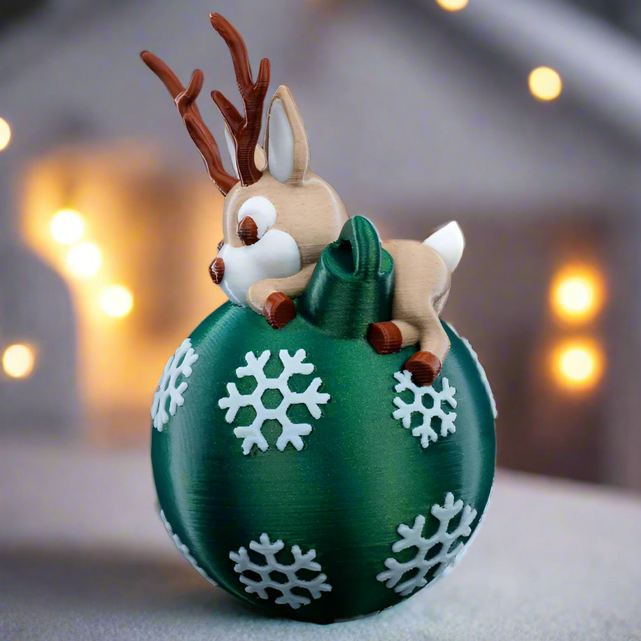 Close-up of the Lying Reindeer Christmas ornament, showing detailed craftsmanship