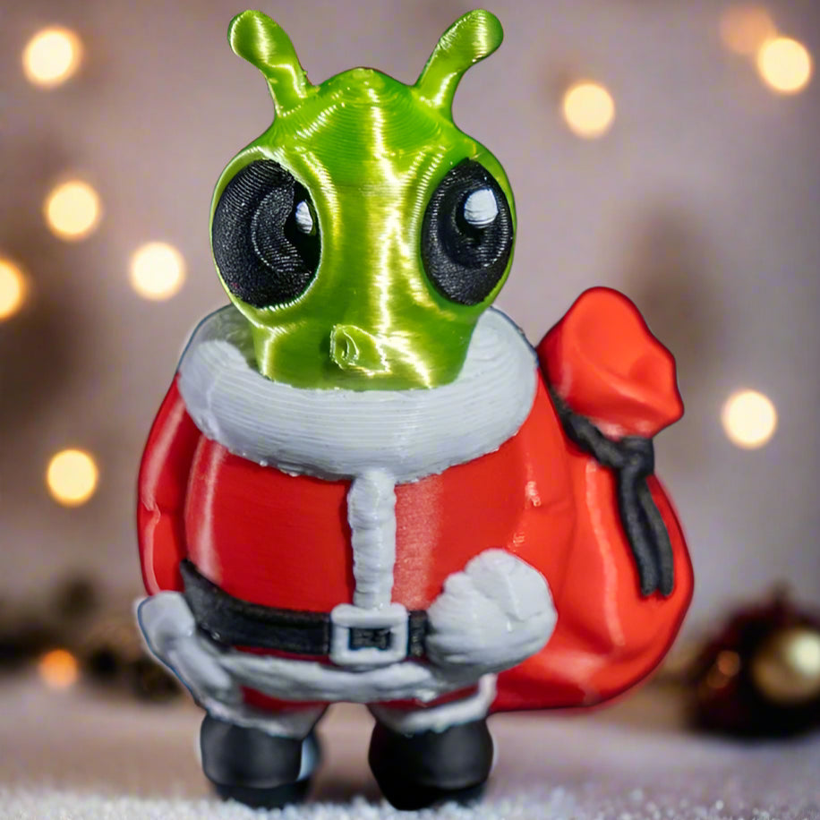 Whimsical Mr. Santa E.T. – an ornament that doubles as a quirky desk decoration or holiday gift