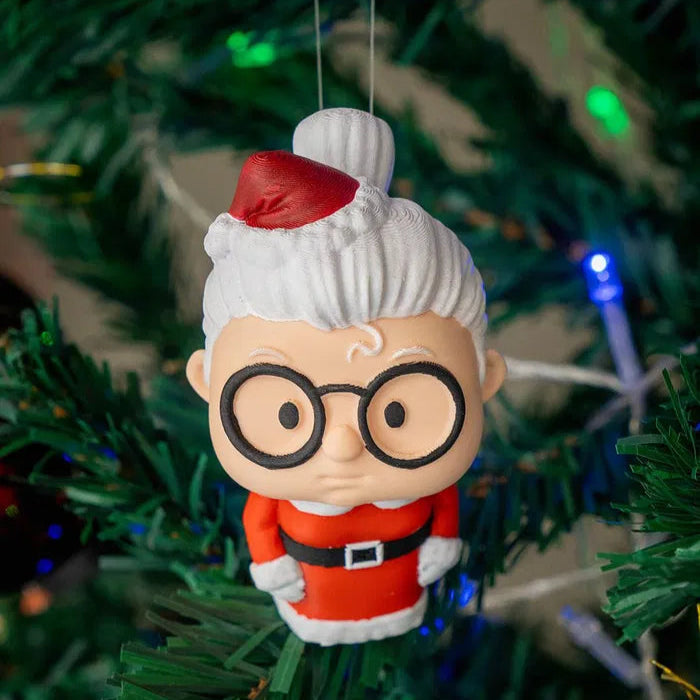 Mrs. Santa E.T. – a charming holiday ornament with a removable alien head for a humorous touch