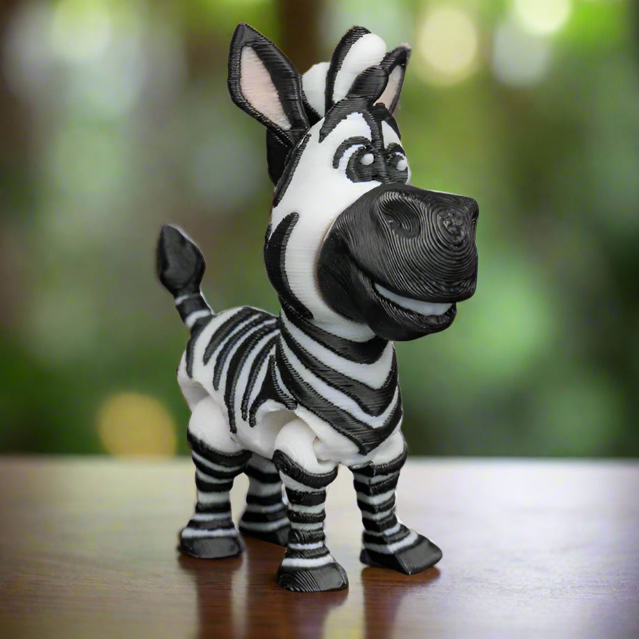 Cute elephant keychain in gray PLA with big ears and a smiling expression, created using 3D printing technology for animal lovers and kids alike.