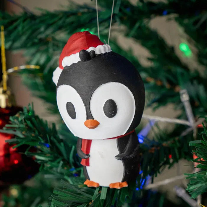 Festive Penguin E.T. – a fun and quirky holiday ornament featuring an alien penguin character