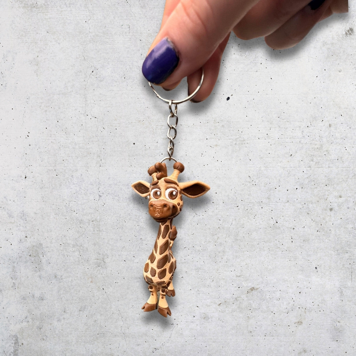 3D-printed zebra keychain made from eco-friendly PLA, with black-and-white striped design and playful cartoon style, perfect for kids or animal lovers.