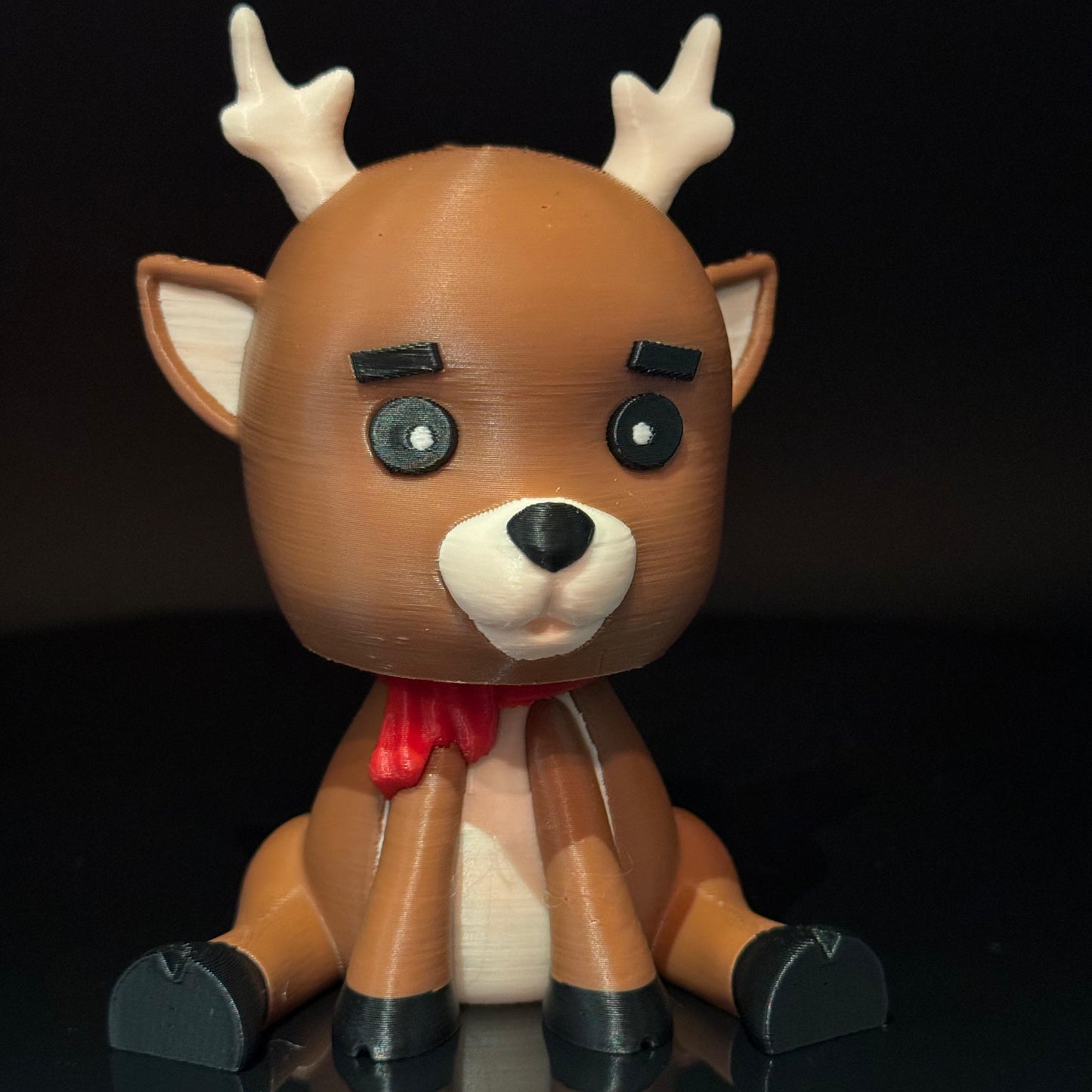 Rudolph the Deer E.T. – a quirky holiday ornament combining a reindeer design with an extraterrestrial touch