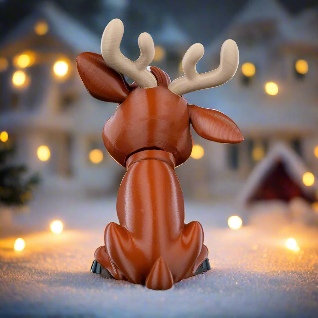 Side view of Rudy the Red-Nose showing vibrant holiday colors.