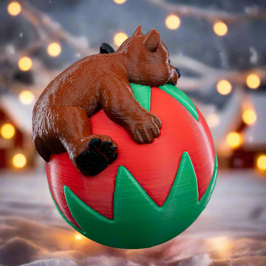Unique 3D printed bear ornament hanging on a Christmas tree