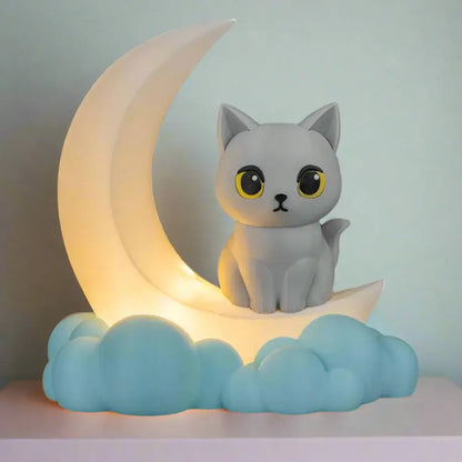 Cat-shaped night light on a crescent moon with cloud base