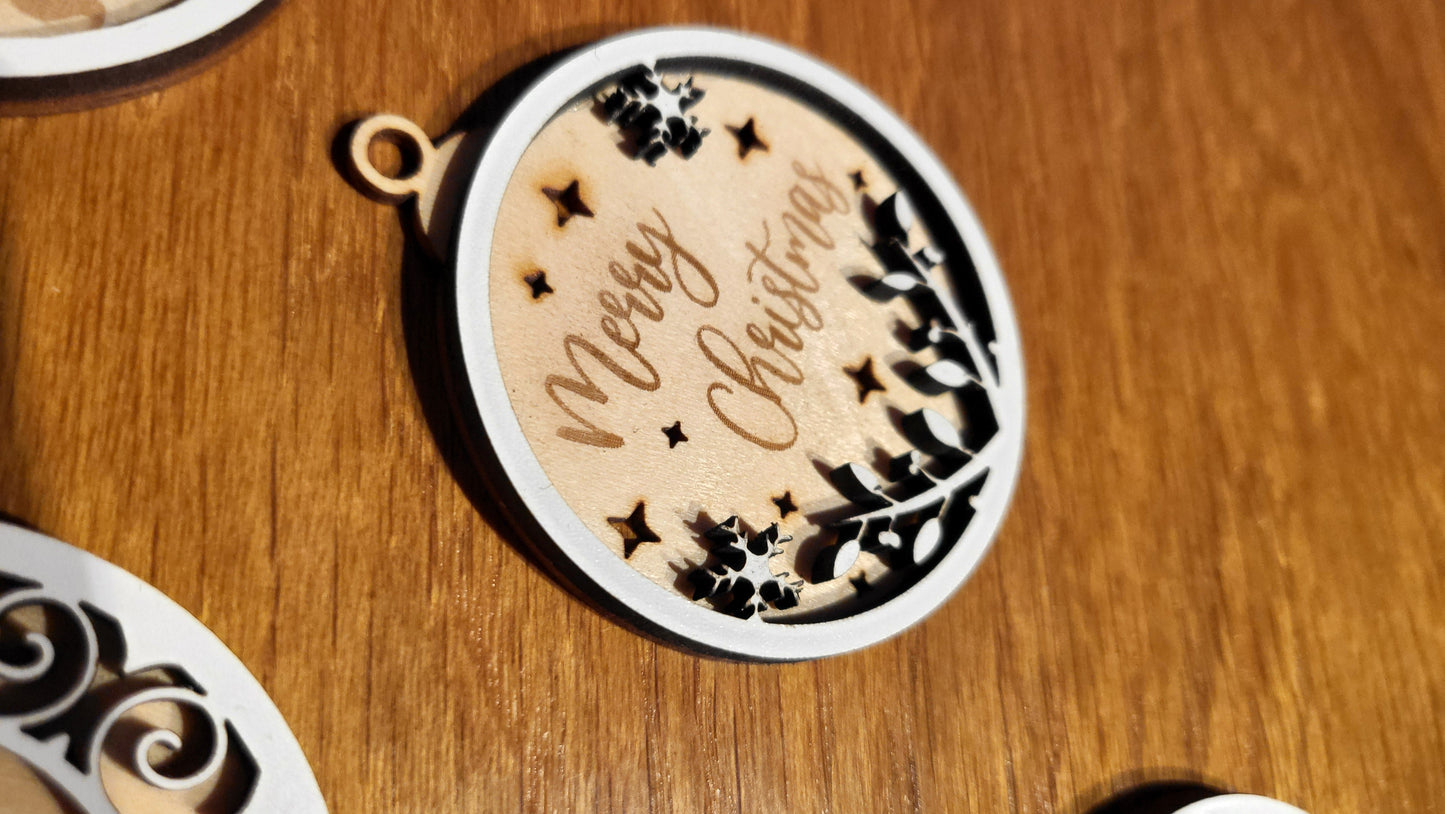 Handcrafted wooden ornament featuring a "Let it Snow" message and snowflakes