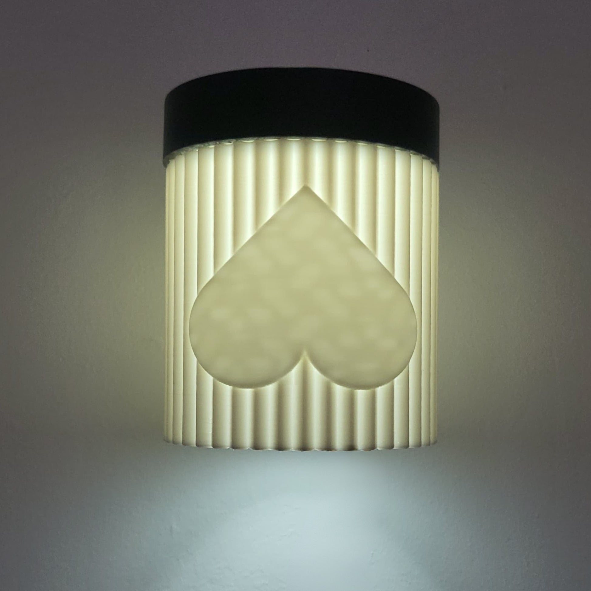 Wall-mounted light fixture with a unique design on a gray background