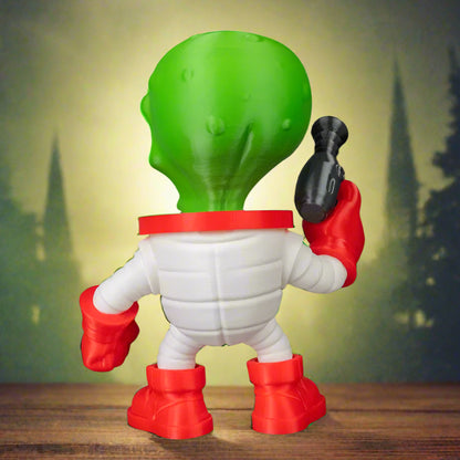 Toy figure with green head, white body, and red shoes on a black background