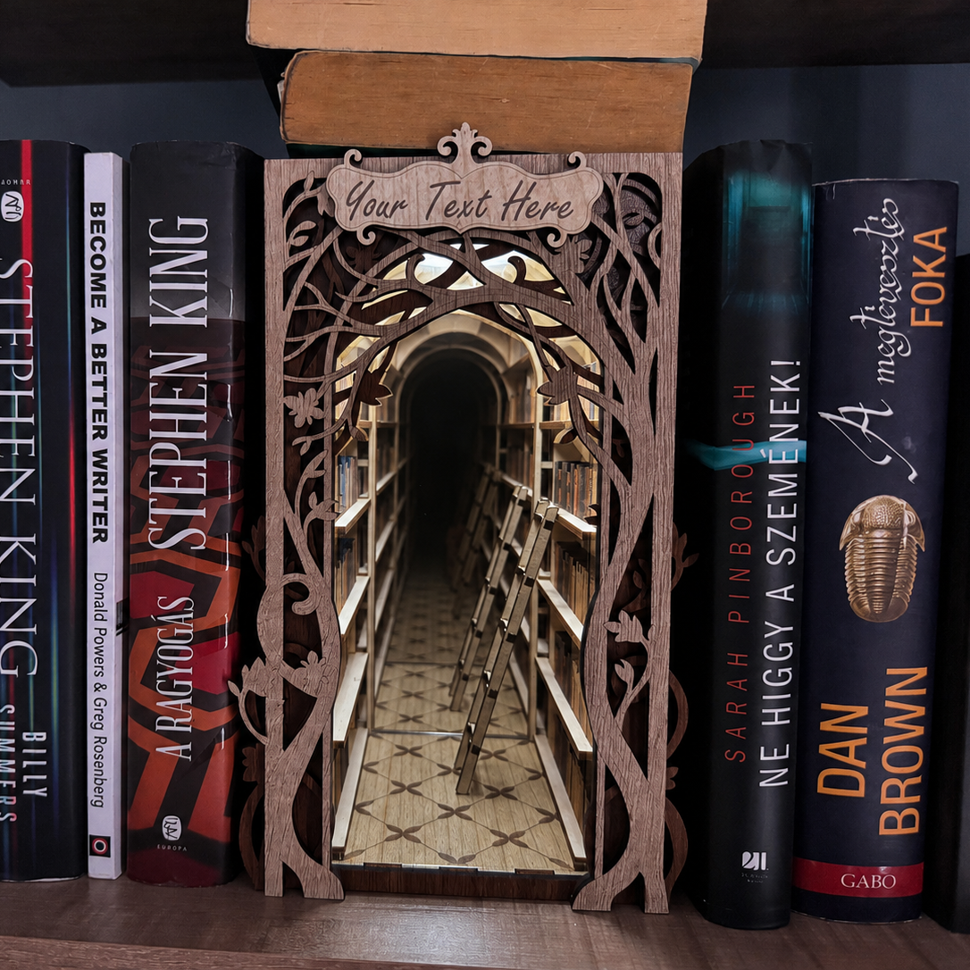 Wooden bookshelf model with books on a dark surface