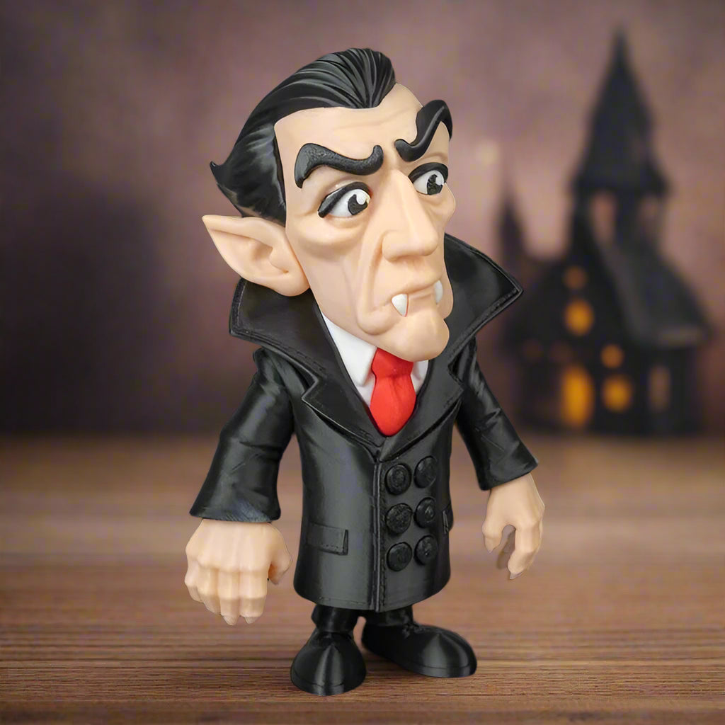 Toy figure of a character with a black coat and red tie on a black background