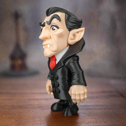 Toy figure of a character with pointed ears and a suit on a black background