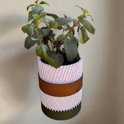 Plant pot on a corporate reception desk with welcome message
A minimalist reception area with the pot placed at the front desk, engraved with “Welcome” or a company name. It creates a friendly first impression for visitors and emphasizes the blend of greenery and branding, making it a thoughtful detail for professional environments and hospitality settings.