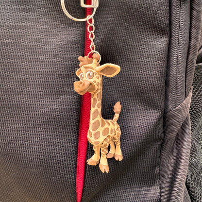 Adorable elephant keychain with oversized ears and a happy expression, made from lightweight eco-friendly PLA using 3D printing technology.