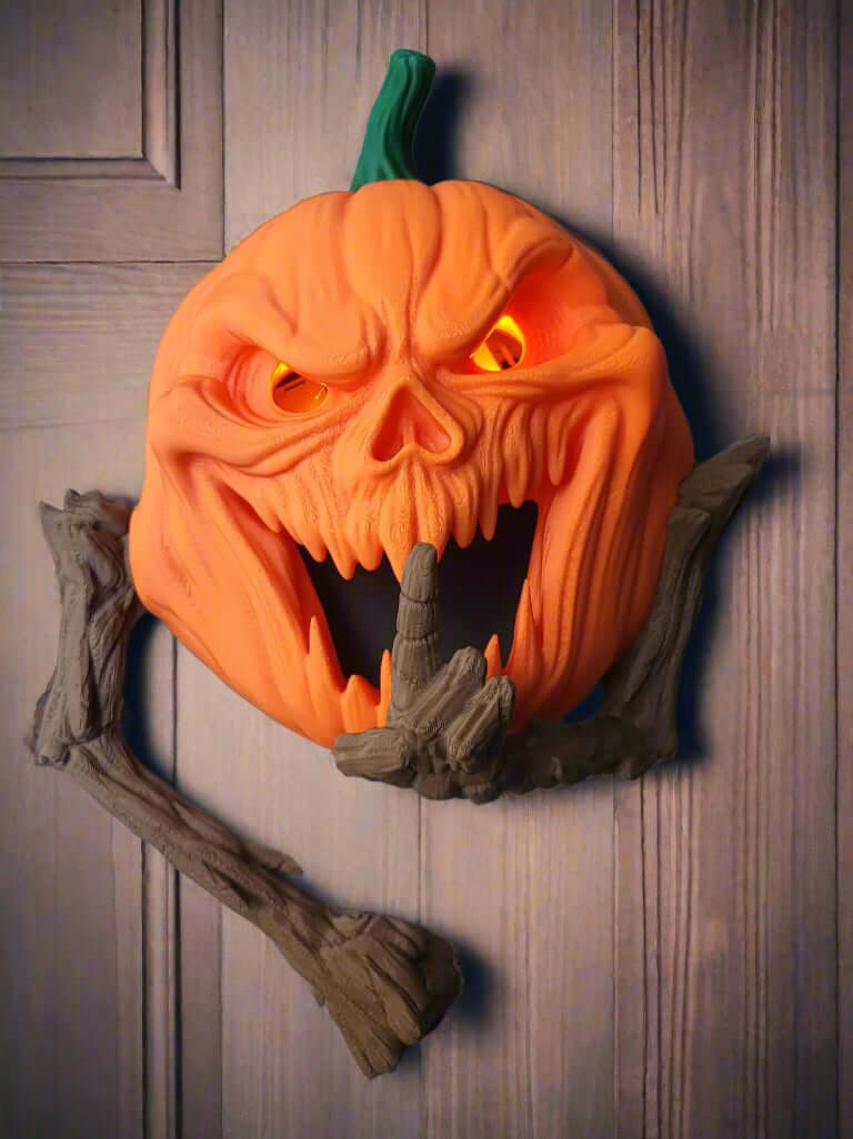 Halloween pumpkin with carved face and glowing eyes on a wooden background