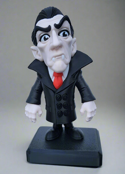 Animated character figurine with a black coat, red tie, and white gloves on a gray background