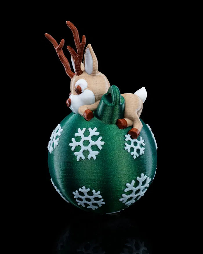 Close-up of the Lying Reindeer Christmas ornament, showing detailed craftsmanship