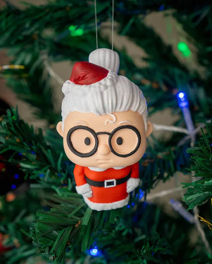 Mrs. Santa E.T. – a charming holiday ornament with a removable alien head for a humorous touch