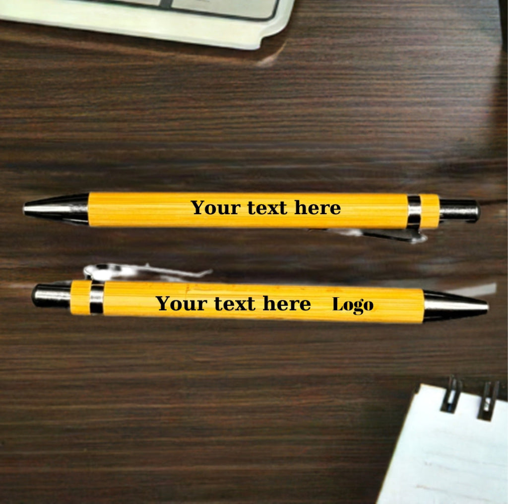 A beautifully crafted bamboo pen resting on a matching wooden case, showcasing a custom-engraved message. Ideal for gifts or personal use.