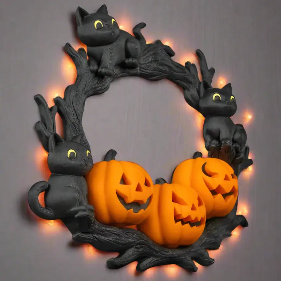 Halloween wreath with black cats and jack-o'-lanterns on a black background