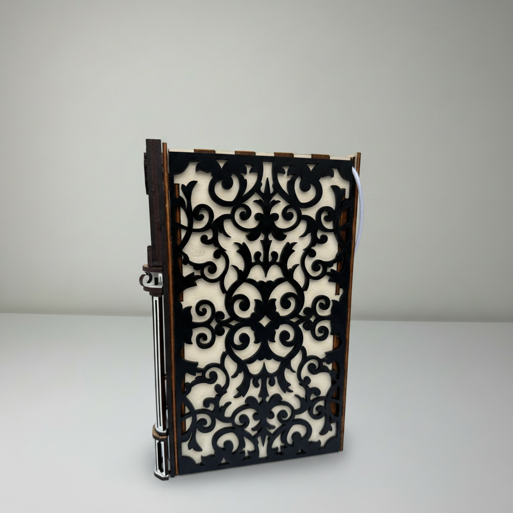 Notebook with decorative black and white pattern on a gray background
