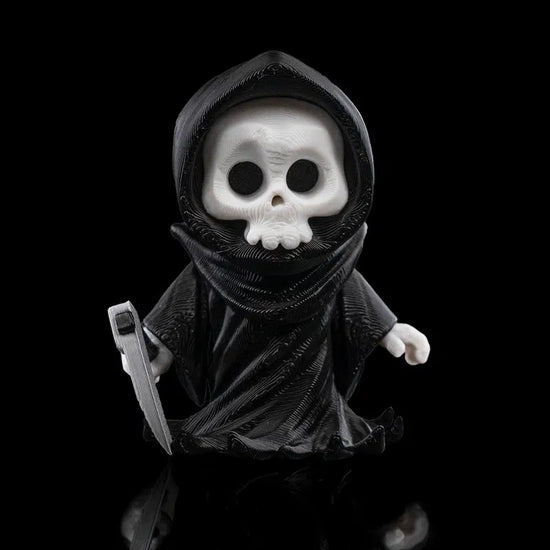The Death Keychain – a creepy yet cool keychain that’s perfect for adding a gothic touch to your accessories.